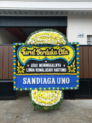 Papan Bunga Duka di Seberang