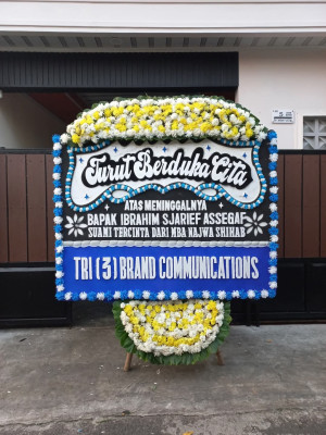 Papan Bunga Duka di Seberang